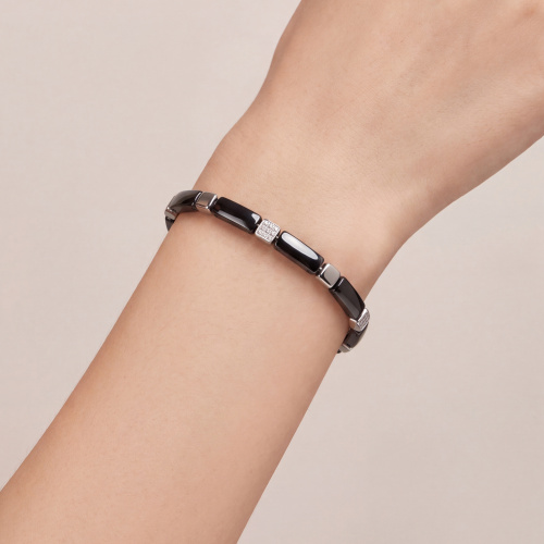 Preview: Armband aus Keramik schwarz mit Edelstahl und 27 Zirkonia 21 cm verkürzbar