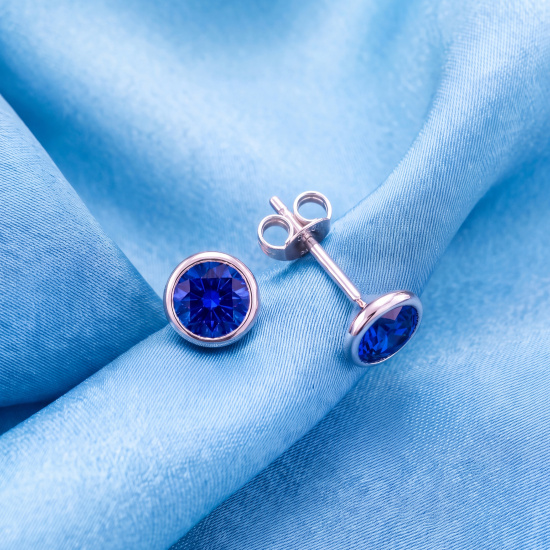 Ohrstecker rund 925 Sterling Silber rhodiniert 2 Zirkonia blau Ohrringe